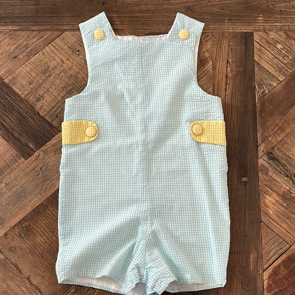 Teal and yellow seersucker romper. Like new.